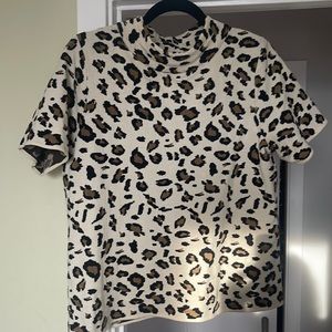 Anthropologie mock neck leopard top